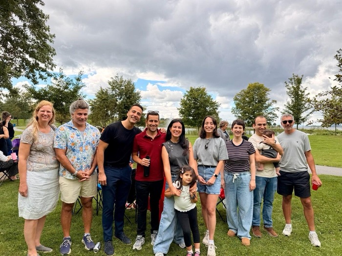 Mert with clients and their families at his client appreciation event