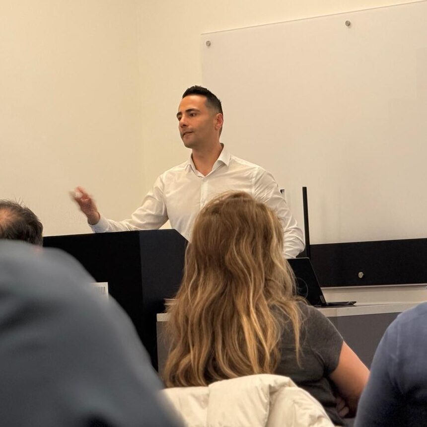 Mert leading a real estate presentation