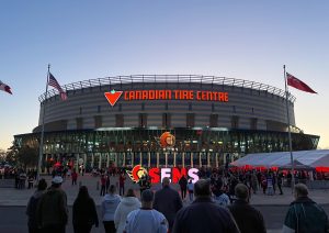 Crowds outside the Canadian Tire Centre in Kanata at dusk